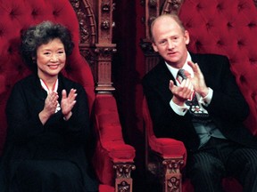 Then-Governor general Adrienne Clarkson and her husband John Ralston Saul share a few words as they applaud entertainers during her Installation as Governor General in Ottawa Oct 7, 1999.