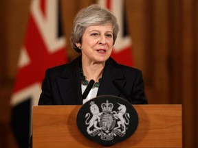 Britain's Prime Minister Theresa May speaks during a press conference in London.