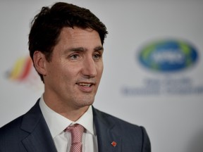 Prime Minister Justin Trudeau speaks at a press conference during the Asia-Pacific Economic Cooperation (APEC) summit in Port Moresby on November 18, 2018.