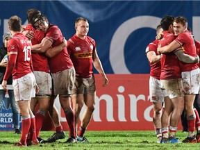 Canadian team players celebrate after their victory in 2019 Japan Rugby Union World Cup qualifying match between Hong Kong and Canada at The Delort Stadium in Marseille, southern France on November 23, 2018.