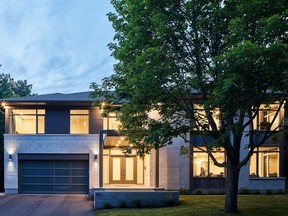 The transformed home is now visually appealing, with rich limestone and dark wood panels. Potlights also highlight the dramatic canopy at the entrance of the home.