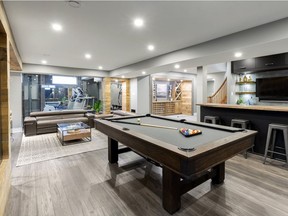 Homeowner Sonia Lemire wanted the renovated basement to be the "it" place for her two sons and their friends as they grow older. With a pool table, bar, gym and theatre it's hard to imagine a better hangout spot.