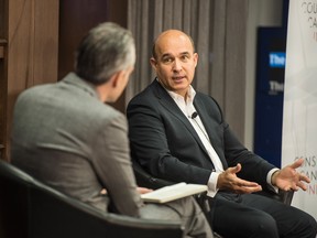 Jim Balsillie, right, speaks with Kevin Carmichael at the Financial Post's Innovation Nation launch.