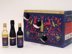 In this Nov. 26, 2018, photo Aldi's Wine Advent Calendar is displayed in New York. The cardboard calendars, typically filled with chocolates, are now being stuffed with cans of beer or bottles of wine. And, making a pairing, others are filled with chunks of cheese.