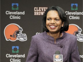 FILE- In this Oct. 21, 2010, file photo former Secretary of State Condoleezza Rice talks with the media after visiting with the Cleveland Browns coaches and players at the Browns training facility in Berea, Ohio. Browns general manager John Dorsey says the team has not discussed Rice as a candidate for its coaching vacancy. Rice is an avid Browns fan and has visited the team's headquarters on numerous occasions in recent years.