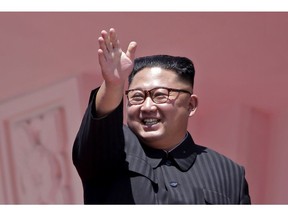 FILE - In this Sunday, Sept. 9, 2018 file photo, North Korean leader Kim Jong Un waves after a parade for the 70th anniversary of North Korea's founding day in Pyongyang, North Korea. North Korea says leader Kim has observed a successful testing of a "newly developed high-tech tactical" weapon. The report Friday, Nov. 16, 2018, from state media didn't say what sort of weapon it was, although it didn't appear to be a nuclear or missile related test.