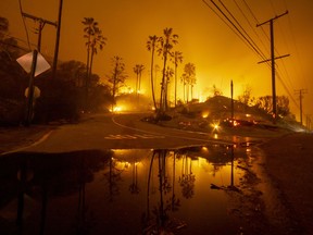 The Woolsey Fire burns above Malibu, Calif., on Nov. 10.