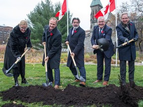 From left, Isabelle Mondou, assistant deputy minister, Canadian Heritage, NCC chairman Marc Seaman, Pablo Rodriguez, minister of Canadian Heritage and Multiculturalism, Ludwig Klimkowski, chairman, Tribute to Liberty, and NCC chief executive Mark Krismanson perform ceremonial sod turning for the Victims of Communism Memorial.
