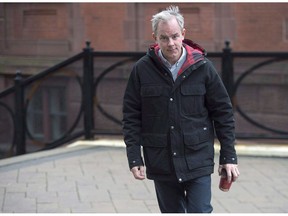 Dennis Oland arrives at the Law Courts in Saint John, N.B., on Tuesday, Nov. 6, 2018. The stalled retrial of Dennis Oland for the second degree murder of his father, Richard Oland, is due to resume on Tuesday morning in a Saint John courtroom.