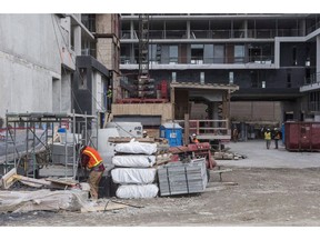 Work on a housing development in Toronto's Lawrence Heights neighbourhood continues ahead of a visit from Prime Minister Justin Trudeau to make a policy announcement, on Wednesday November 22, 2017. The first details from the Liberal government's decade-long housing plan show early spending has helped keep some 14,000 households in affordable units.