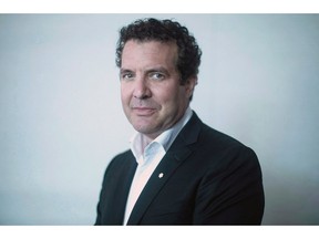 Rick Mercer poses for a photo in his publisher's Toronto office as he promotes his new book "Rick Mercer Final Report," on Wednesday, October 10, 2018.