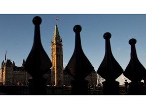 Parliament Hill in Ottawa is pictured on October 29, 2013. The Trudeau government is seeking to give federally regulated workers additional paid personal leave days in a proposal that arrives as the Ontario government moves to cut back employees' time-off entitlements in the province.