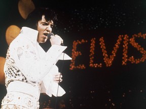 This 1972 file photo shows Elvis Presley, the King of Rock 'n' Roll, during a performance.