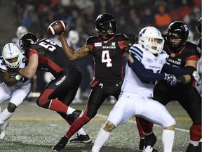 Ottawa Redblacks quarterback Dominique Davis steps into a throw against the Toronto Argonauts during the first half at TD Place on Friday, Nov. 2, 2018.