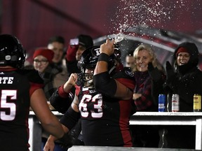 Ottawa Redblacks offensive lineman Jon Gott was a Twitter sensation on Friday night after chugging a beer and smashing the can on his helmet while celebrating a Redblacks touchdown against the Toronto Argonauts during the second half at TD Place.