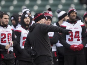 Redblacks head coach Rick Campbell takes part in a team walk-though at Commonwealth Stadium in Edmonton on Saturday, the eve of the Grey Cup game against the Calgary Stampeders.