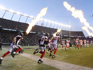 Members of the Ottawa Redblacks make their way onto the field for the 106th Grey Cup against the Calgary Stampeders at Commonwealth Stadium in Edmonton, Sunday, November 25, 2018.
