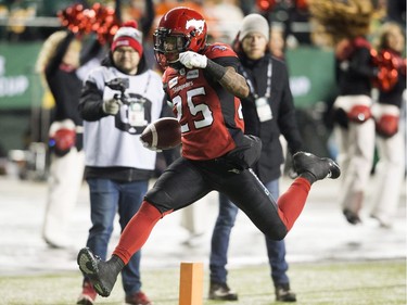 Calgary Stampeders running back Don Jackson (25) runs in a touchdown during the first half of the 106th Grey Cup against the Ottawa Redblacks in Edmonton, Alta. Sunday, Nov. 25, 2018.