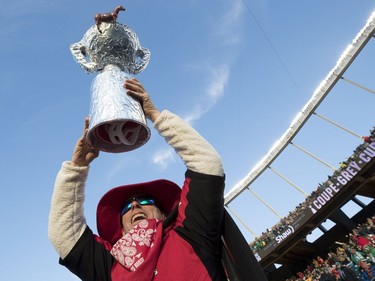 A football fan cheers ahead of the 106th Grey Cup between the Calgary Stampeders and Ottawa Redblacks during the 106th Grey Cup at Commonwealth Stadium in Edmonton, Sunday, November 25, 2018.