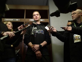 Redblacks quarterback Trevor Harris, shown here speaking to reporters in the team's locker room on Tuesday, is one of more than 30 Ottawa players who can become free agents this offseason.