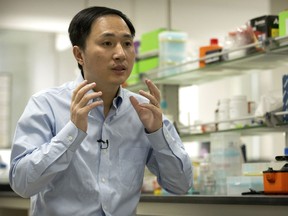 In this Oct. 10, 2018 photo, He Jiankui speaks during an interview at a laboratory in Shenzhen in southern China's Guangdong province. Chinese scientist He claims he helped make world's first genetically edited babies: twin girls whose DNA he said he altered. He revealed it Monday, Nov. 26, in Hong Kong to one of the organizers of an international conference on gene editing.