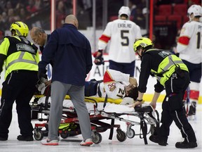 Florida Panthers centre Vincent Trocheck (21) is taken off the ice on a stretcher while taking on the Ottawa Senators during first period NHL hockey action in Ottawa on Monday, Nov. 19, 2018.