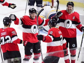 The Ottawa Senators celebrate a goal by defenceman Dylan DeMelo against the Buffalo Sabres during the second period on Thursday, Nov. 1, 2018.