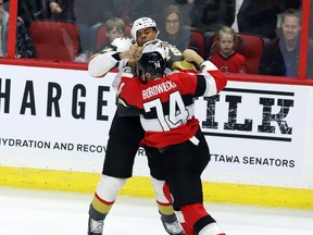 Ottawa Senators defenceman Mark Borowiecki (74) and Vegas Golden Knights right wing Ryan Reaves (75) fight during second period on Thursday night. THE CANADIAN PRESS/Fred Chartrand