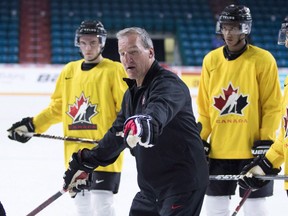 Canada Head Coach Tim Hunter gives some instructions during practice at the Sandman Centre in Kamloops, B.C., Monday, July, 30, 2018.