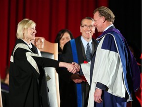 Daniel Alfredsson receives his Honorary Degree from the Carleton University President and Vice-Chancellor, Roseanne O'Reilly Runte in June. 2016.