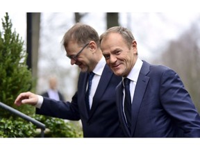 Finland's Prime Minister Juha Sipila, left, welcomes European Council President Donald Tusk at the Prime Minister's official residence Kesaranta in Helsinki, Finland, Wednesday Nov. 7, 2018. Conservative leaders from across Europe are gathering to plot their strategy to win the next EU elections, and must decide whether Hungary's stridently nationalist ruling party should remain in their political family.
