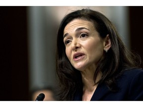 FILE- In this Sept. 5, 2018, file photo Facebook COO Sheryl Sandberg testifies before the Senate Intelligence Committee hearing on Capitol Hill in Washington. Having already acknowledged that it did opposition research on George Soros, Facebook says No. 2 Sandberg had asked staff if the billionaire philanthropist had financial motivations against the company. The Friday, Nov. 30, statement is in response a New York Times article that describes Sandberg asking Facebook staff to look into Soros' financial interests in speaking out against the company in January.