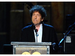 FILE - In this Feb. 6, 2015 file photo, Bob Dylan accepts the 2015 MusiCares Person of the Year award at the 2015 MusiCares Person of the Year show in Los Angeles.