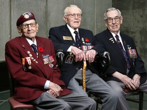 Ralph Mayville, Jim Summersides and Jack Callowhill pose for a photo at the Canadian War Museum in Ottawa  Wednesday Nov 21 2018. These three Canadian veterans from the Second World War First Special Service Force -- the Devil's Brigade -- were on hand to receive the Congressional Gold Medal from the U.S. government Wednesday.