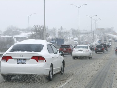 Highway 417 traffic after a overnight snow storm in Ottawa Friday Nov 17, 2018.