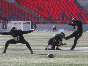 Ottawa Redblacks Louis-Philippe snaps the ball to Richie Leone as Lewis Ward kicks a field goal during practice at TD Place in Ottawa Wednesday Nov 14, 2018.