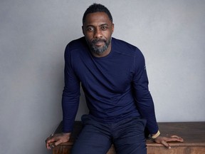 FILE - In this Jan. 21, 2018, file photo, actor-director Idris Elba poses for a portrait to promote his film "Yardie" at the Music Lodge during the Sundance Film Festival in Park City, Utah. On Monday, Nov. 5, 2018, Elba was named Sexiest Man Alive by People magazine.