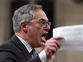 Conservative MP Tony Clement asks a question during question period in the House of Commons in this 2017 file photo.