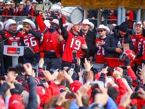 The Calgary Stampeders are cheered on by fans during a noon-hour Grey Cup rally at city hall on Tuesday, Nov. 27, 2018.