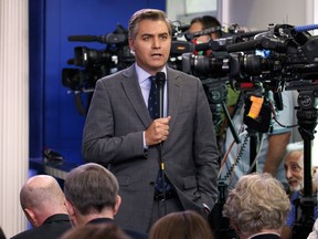 FILE - In this Aug. 2, 2018 file photo, CNN correspondent Jim Acosta does a stand up before the daily press briefing at the White House in Washington. The White House on Wednesday suspended the press pass of CNN correspondent Jim Acosta after he and President Donald Trump had a heated confrontation during a news conference.