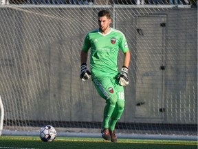 Ottawa Fury FC goalkeeper Maxime Crépeau prepares to advance the ball during a United Soccer League match against Toronto FC II at at Allan A. Lamport Stadium in Toronto on Wednesday, Sept. 26, 2018.