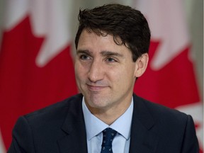 Prime Minister Justin Trudeau participates with business leaders during a roundtable in Singapore, Singapore Wednesday November 14, 2018.