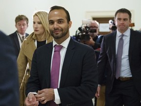 In this Oct. 25, 2018, file photo, George Papadopoulos, the former Trump campaign adviser who triggered the Russia investigation, arrives for his first appearance before congressional investigators on Capitol Hill in Washington.