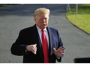 President Donald Trump speaks to reporters on the South Lawn before leaving the White House in Washington, Thursday, Nov. 29, 2018 to attend the G20 Summit in Buenos Aires, Argentina.