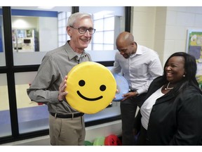 Governor-elect Tony Evers, left, and Lt. Governor-elect Mandela Barnes, right, with pillows found on the tour of the Boys & Girls Club of Dane County. State Rep-elect Shelia Stubbs (D-Madison) is right. On Wednesday Nov. 7, 2018 Governor-elect Tony Evers, and Lt. Governor elect Mandela Barnes took a tour of the Boys & Girls Club of Dane County in Madison, Wis.