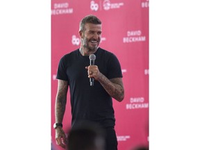 Footballer David Beckham smiles during a sponsored promotional event in Bangkok, Thailand, Saturday, Nov 3, 2018. Beckham made a brief appearance to conducted soccer drills and addressed a crowd of around a hundred young soccer fans as part of a sponsored promotional event "AIA Football Clinic for Youth with Leading Coaches" that also featured coaches from Tottenham Hotspurs as well as Thai celebrities and soccer players.