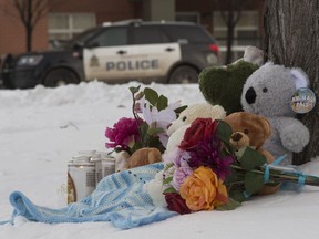 A memorial for two children outside an apartment building at 7920 71 Street, in Edmonton on Friday Dec. 7, 2018.