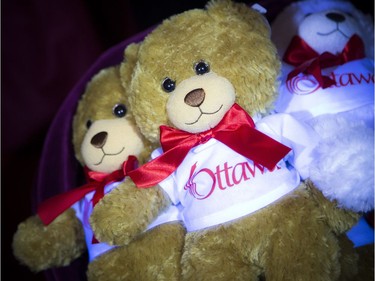 Santa handed out Ottawa teddy bears to the boys and girls at Saturday's event.