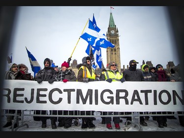 Groups opposed to Canada’s support of the UN Global Compact for Safe, Orderly and Regular Migration held a rally to protest the United Nation Global Compact for Migration while anti-fascism and anti-racism activists counter-protested, Saturday, Dec. 8, 2018 on Parliament Hill.