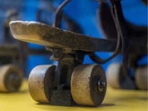 The wheels of a set of wood roller skates with the inscription Dominion, Montreal circa 1880.